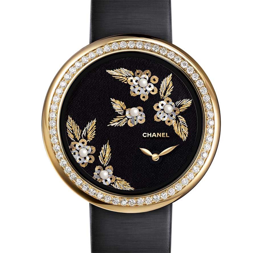 RELOJ EN ORO BLANCO DE 18 QUILATES Y DIAMANTES 
